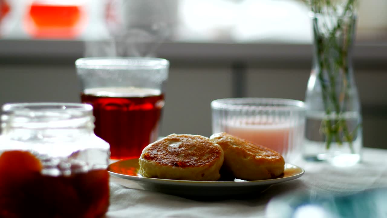 cheesecake and tea on table. Seamless cinemagraph video