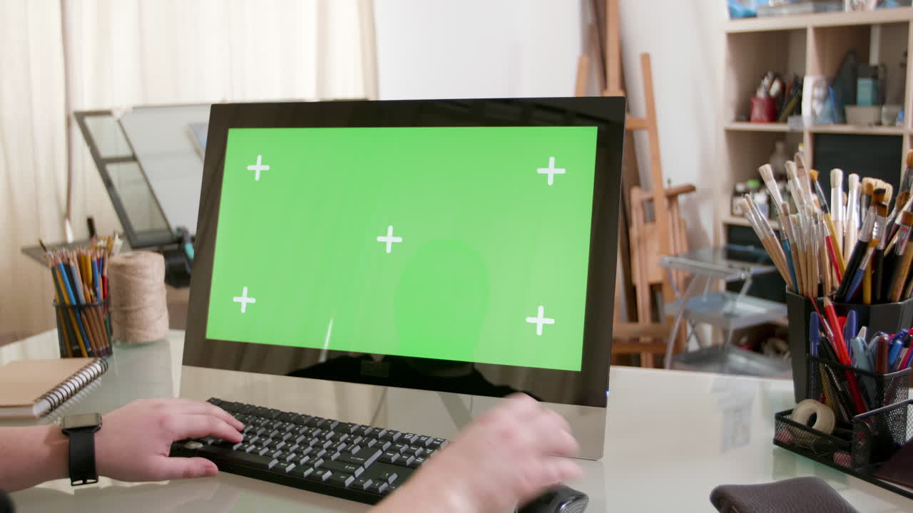 Workspace with Green Screen Computer