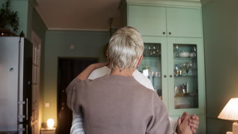 couple dancing at home