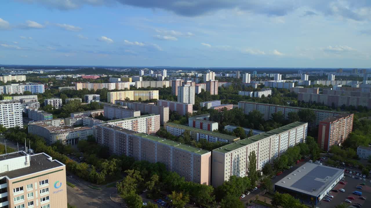 Unbelievable aerial top view flight Large panel system building Apartment, prefabricated housing complex, Berlin Marzahn East German summer 2023