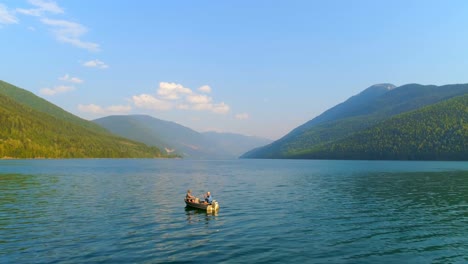 tourists fishing on a boat in river 4k