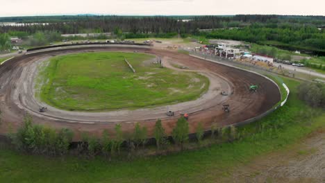 4k drone video of sprint car racing at mitchell raceway in fairbanks, ak during sunny summer evening-13