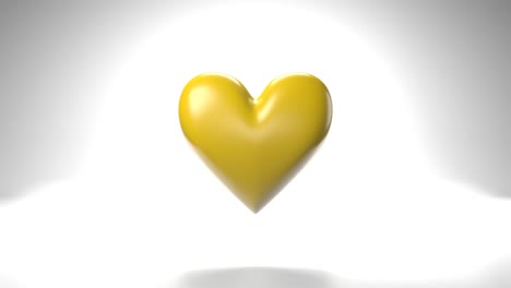 pulsing yellow heart shape object on white background.