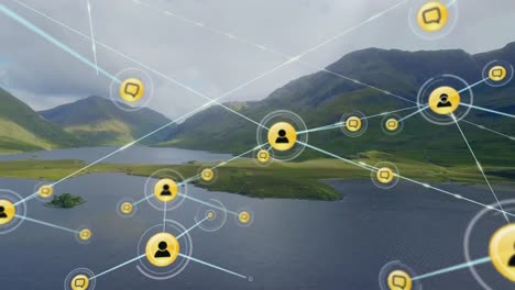 animation of connected icons over aerial view of lake between mountains against cloudy sky