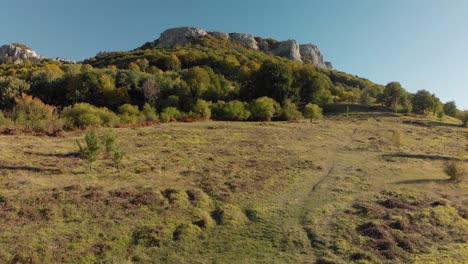 Aerial-drone-shot-climb-uphill-to-the-high-cliffs-1