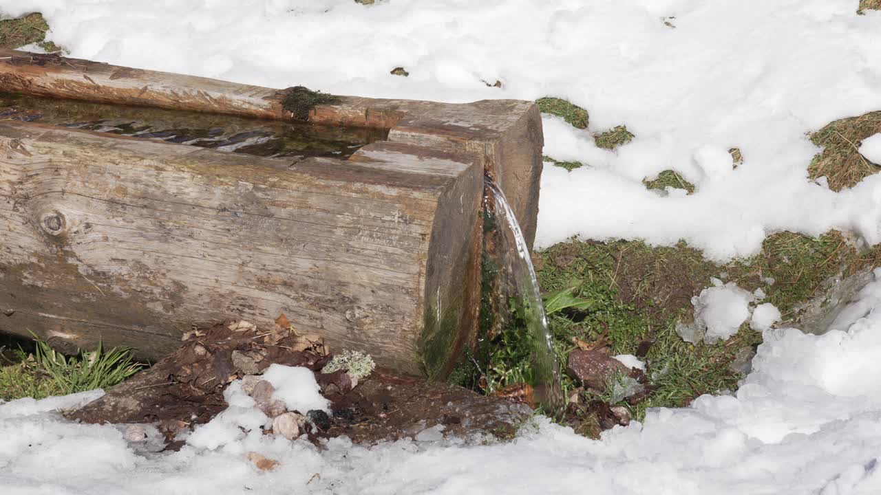 Fresh mountain water hydrate pitstop outdoor Vosges France gutter