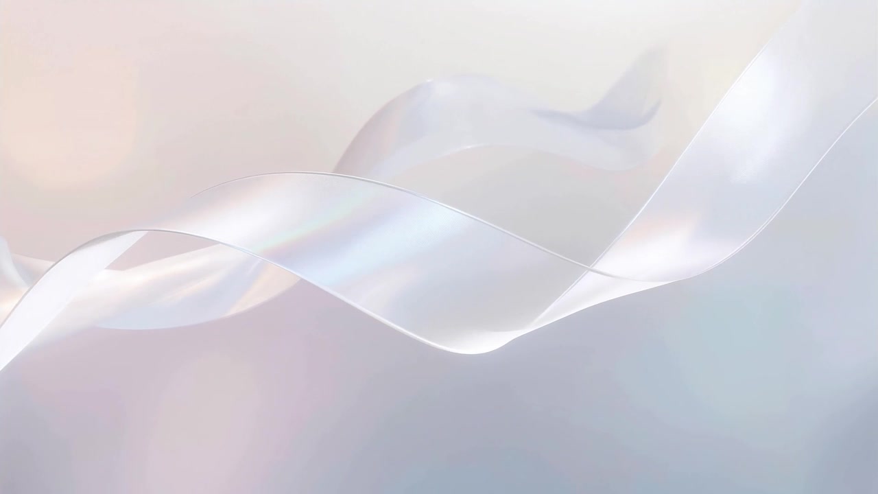 Entering from left sheer ribbon flowing across soft backdrop, creating layered folds and highlights