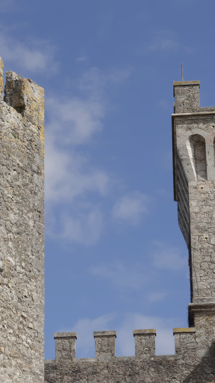 Medieval Stone Castle Walls Against Blue Sky