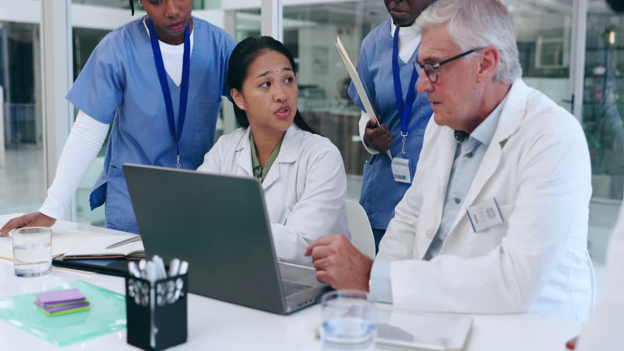 Teamwork, meeting and doctors with a laptop
