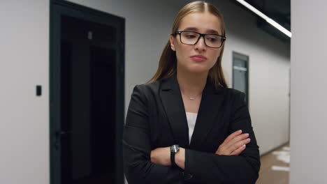 Depressed-manager-walking-office-corridor-closeup.-Upset-girl-feeling-desperate