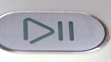 play pause button, macro close up. symbol