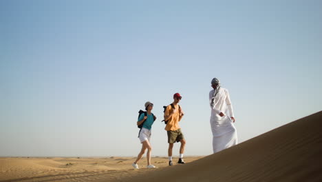 three travelers in the desert