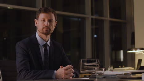 Lawyer-sitting-on-his-desk