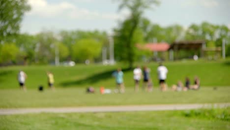 soft focus of people playing at public park