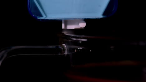 artificial sweetener dispenser on black background