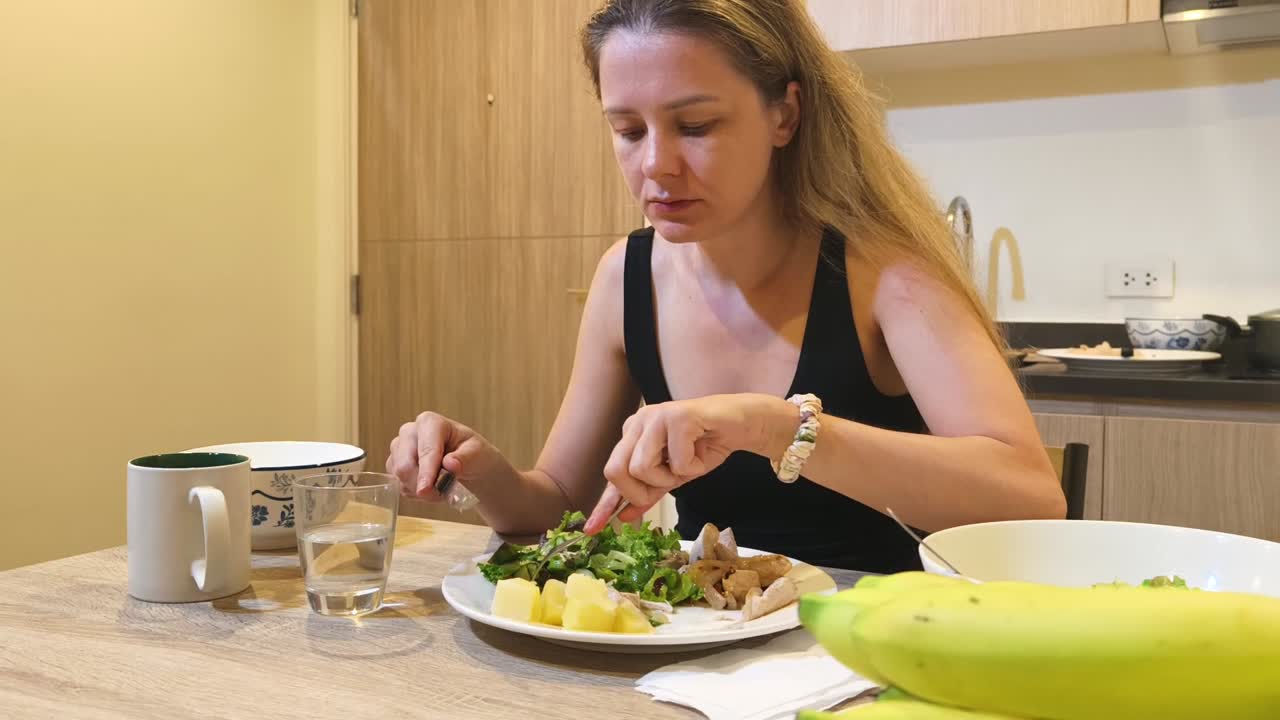 Woman eating a healthy salad for lunch
