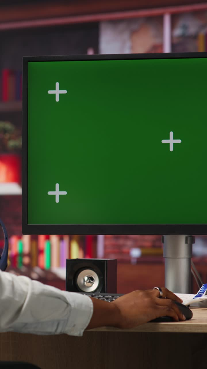 Vertical video Teleworker using green screen PC in home office to write emails