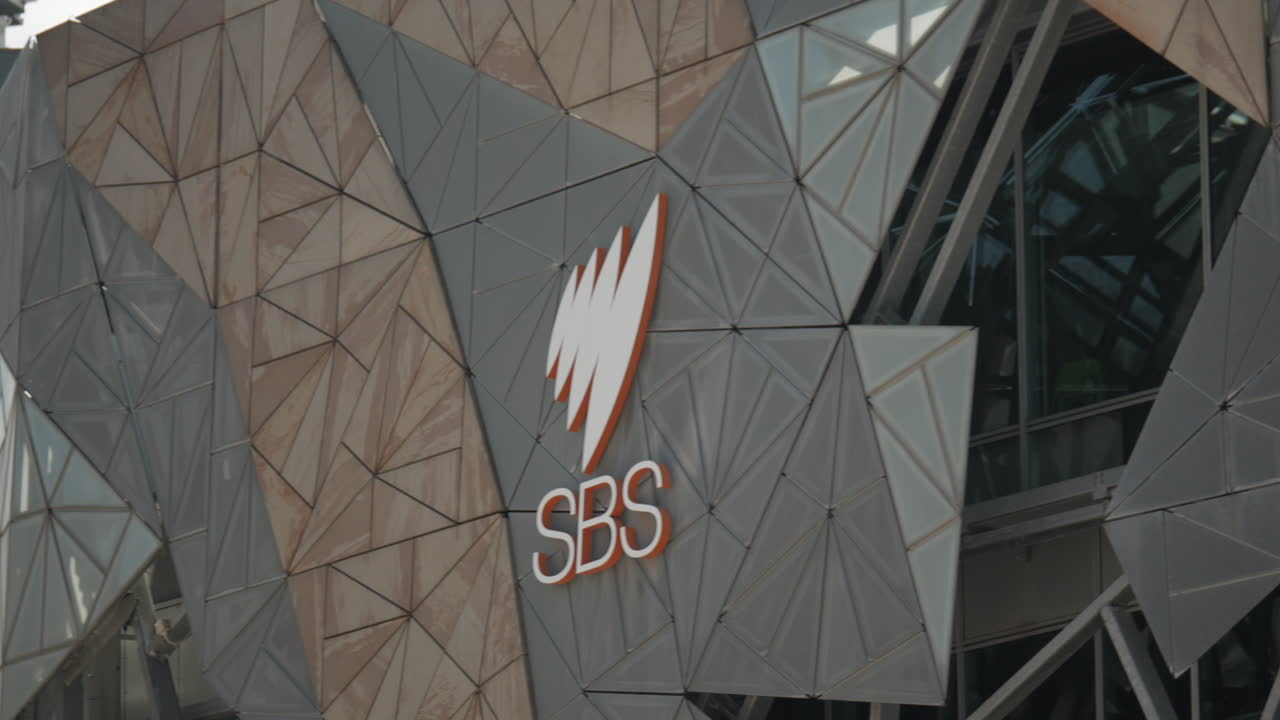 Federation Square Melbourne, Australia. CLOSE UP SHOT of the modern triangular architectural design, PAN RIGHT.