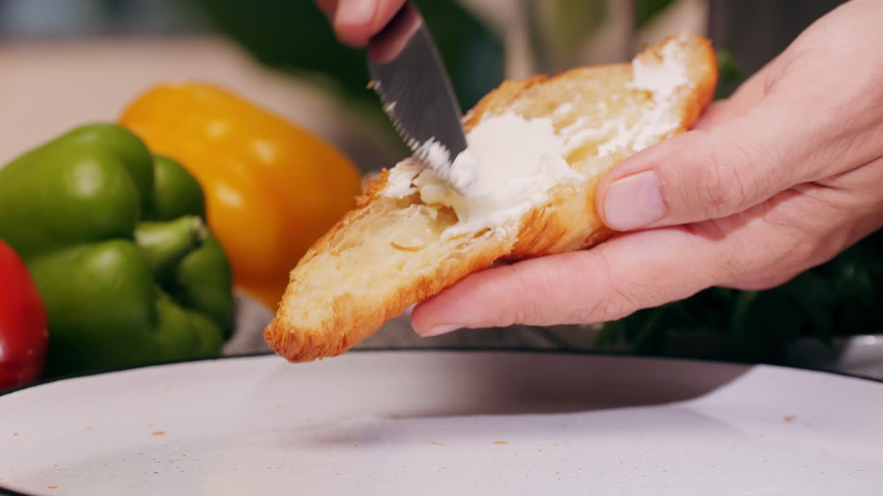 Croissant with jamon ham, Salmon, in Modern Cafe, Top View of Healthy Breakfast in Cafe. English breakfast: fried egg, bacon toast on sandwich.