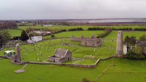 Beautiful-aerial-high-view-orbiting-Clonmacnoise-on-overcast-day