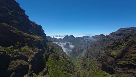 rugged terrain and deep valley in mountains of madeira, portugal