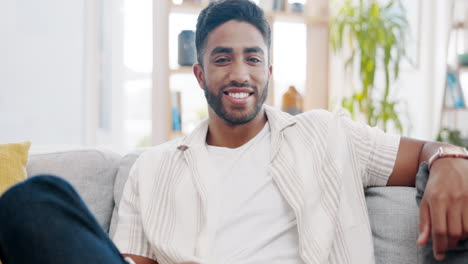 Face,-smile-and-man-relax-on-sofa-for-easy