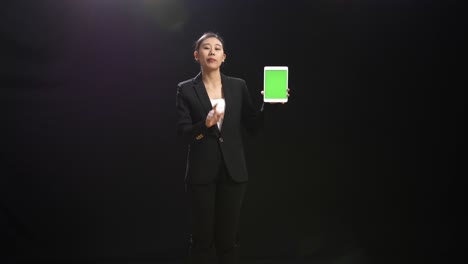 businesswoman presenting with tablet