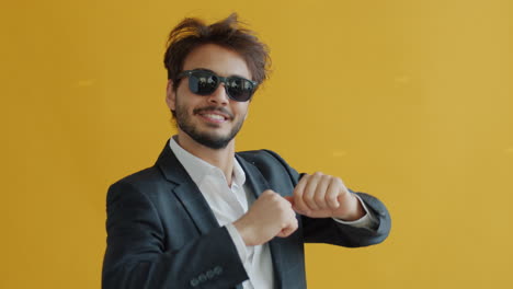 happy man in a suit dancing