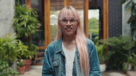 happy transgender person outdoors
