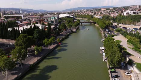 beautiful birds eye view above bridge of peace - tbilisi, georgia. summer