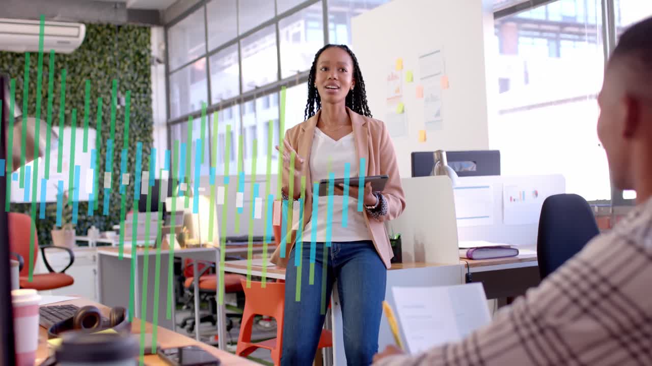 Animation of data processing over diverse business people discussing work in office