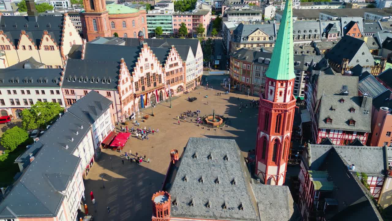 4K Aerial Drone Video of Historic Half-Timbered Buildings and Fountain in the Römerberg Town Square in Frankfurt, Germany