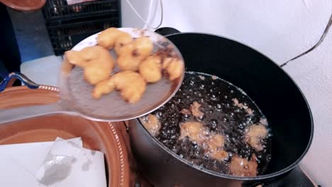 a chef is preparing fish tacos