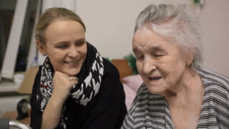 elderly woman and her adult granddaughter