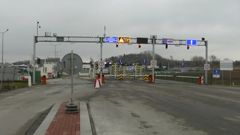 static shot of the car lanes at the ukrainian polish border crossing at a refugee base camp in medyka