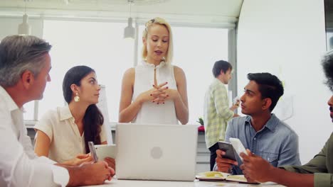 Executive-discussing-during-meeting-4k