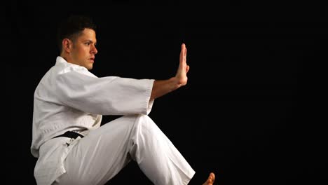 man practicing karate