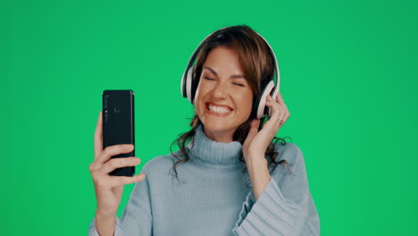 Woman,-phone-and-headphones-listening-to-music