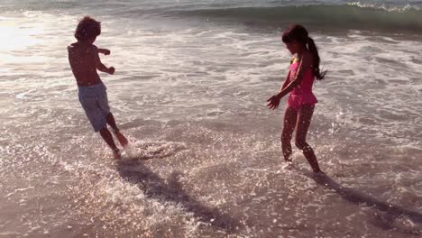 cute children having fun with water