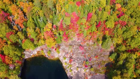 by the great lake, serene and wide, wood and rock stretches on each side