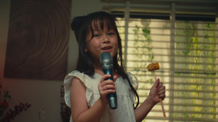 Little Girl Singing and Eating