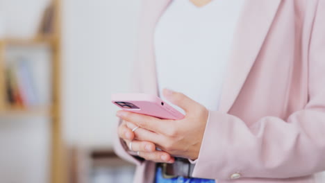 business, woman and hands typing on smartphone