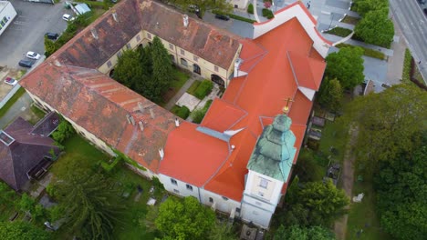 ancient church tower and convent in the old town of szombathely in hungary