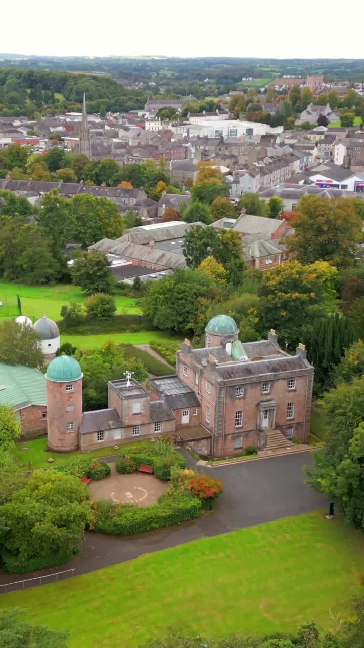 Reversing social ratio 60FPS aerial of the grounds at Armagh Planetarium in County Armagh, Northern Ireland. Produced in 1080x1920 with broadcast ready Rec709 color