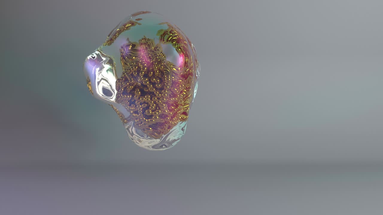 gota de líquido con esferas doradas.