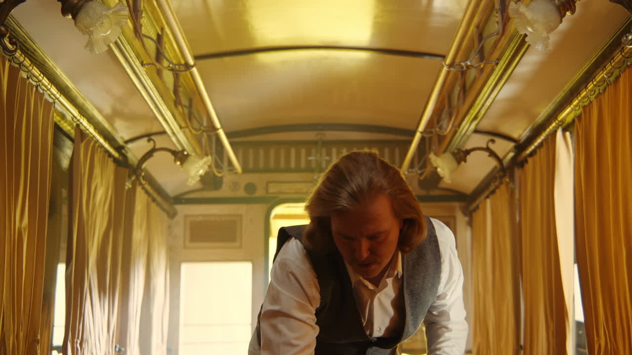 A Man in a Vintage Train Car