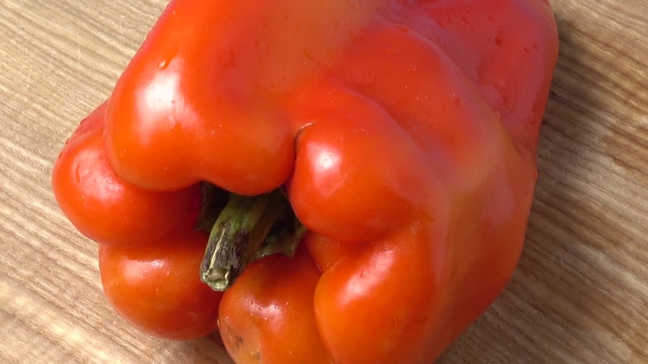 Søt rød paprika. Fotografering i bevegelse