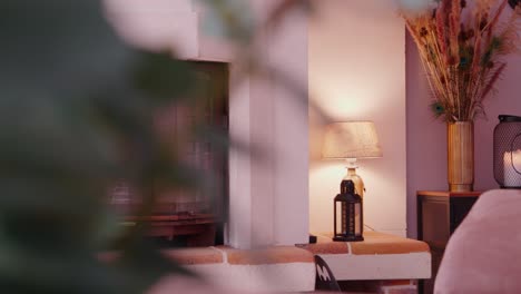 slow revealing shot of a built-in fireplace constructed of brick in a living room