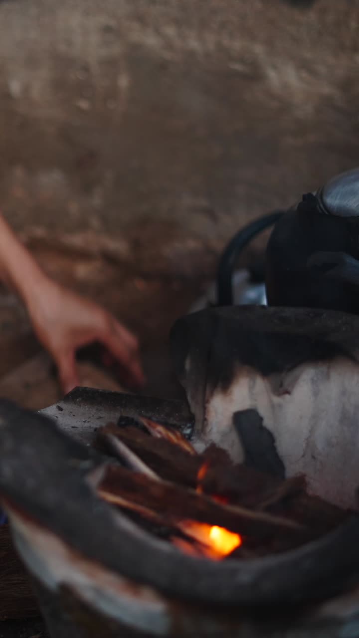 Cooking food over a wood fire