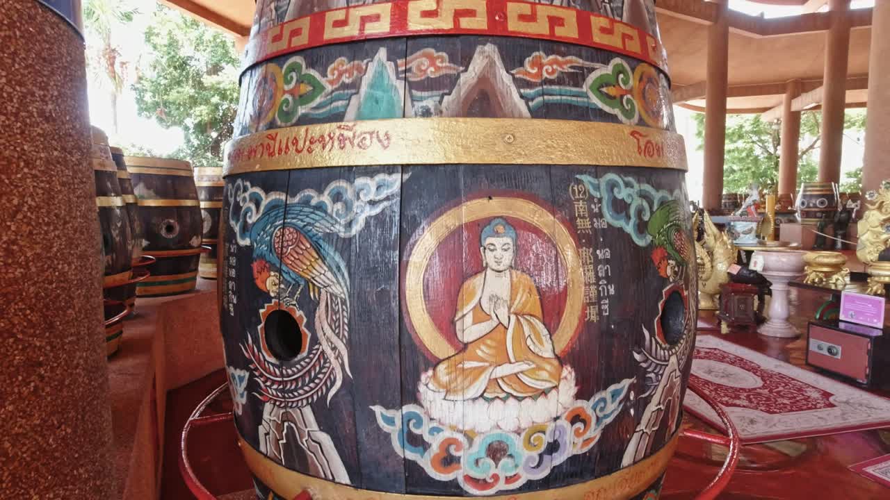Hand Crafted Wooden Barrel Painted with Buddhist Imagery at Guanyin Temple in Bangkok, Thailand